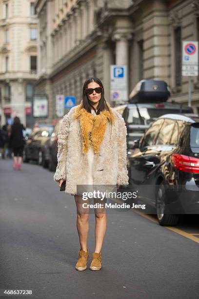 Grazia IT girl Gilda Ambrosio wears a Prada, Balenciaga, Marcolin eyewear, and Saint Laurent Paris shoes on Day 5 of Milan Fashion Week FW15 on March...