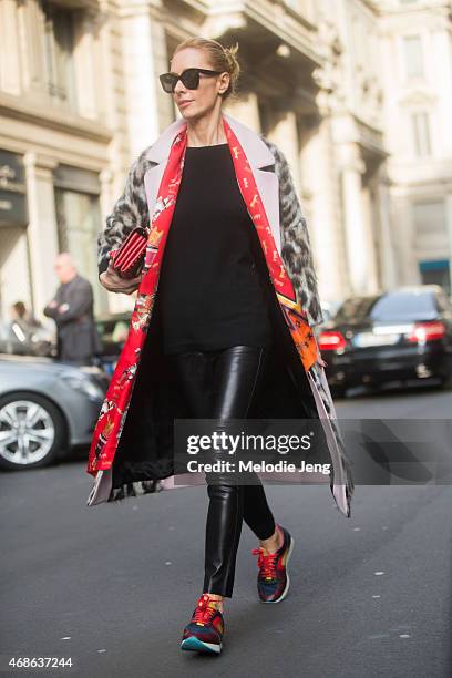 Elina Halimi of Kabuki Paris wears a MSGM coat and Burberry sneakers on Day 5 of Milan Fashion Week FW15 on March 1, 2015 in Milan, Italy.