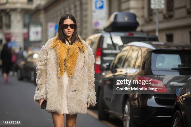 Grazia IT girl Gilda Ambrosio wears a Prada, Balenciaga, Marcolin eyewear, and Saint Laurent Paris shoes on Day 5 of Milan Fashion Week FW15 on March...