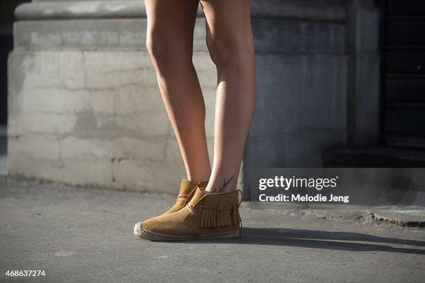 Grazia IT girl Gilda Ambrosio wears a Saint Laurent shoes on Day 5 of Milan Fashion Week FW15 on March 1, 2015 in Milan, Italy.