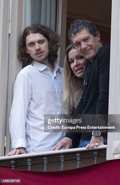 Alexander Bauer, Nicole Kimpel and Antonio Banderas attend Holy procession during Holy Week celebration on March 31, 2015 in Malaga, Spain.
