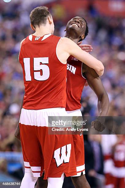 Sam Dekker and Nigel Hayes of the Wisconsin Badgers celebrate after defeating the Kentucky Wildcats during the NCAA Men's Final Four Semifinal at...