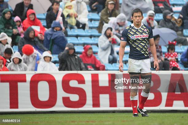 Yusaku Kuwazuru of Japan looks on in the game between Japan and Fiji during day two of the Tokyo Sevens Rugby 2015 at Chichibunomiya Rugby Stadium on...