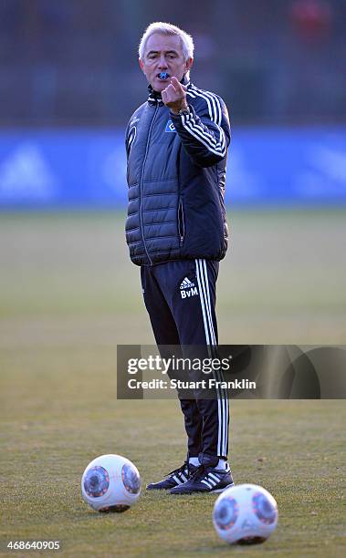 Bert van Marwijk, head coach of Hamburger SV gestures during the training session of Hamburger SV on February 11, 2014 in Hamburg, Germany.