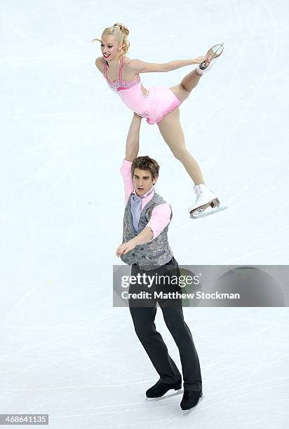 Stacey Kemp and David King of Great Britain compete during the Figure Skating Pairs Short Program on day four of the Sochi 2014 Winter Olympics at...