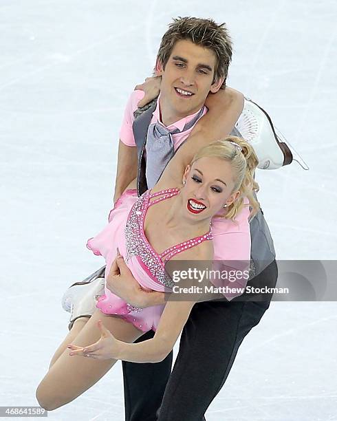 Stacey Kemp and David King of Great Britain compete during the Figure Skating Pairs Short Program on day four of the Sochi 2014 Winter Olympics at...