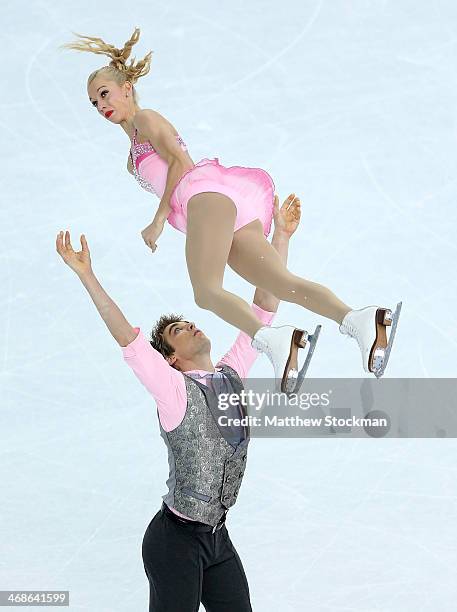 Stacey Kemp and David King of Great Britain compete during the Figure Skating Pairs Short Program on day four of the Sochi 2014 Winter Olympics at...