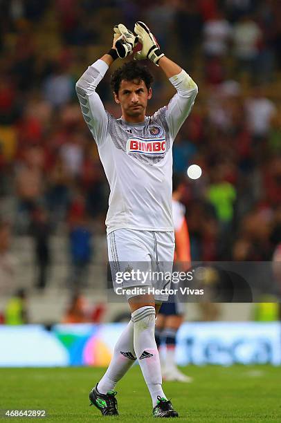 Luis Michel of Chivas claps after stopping a penalty kick during a match between Atlas and Chivas as part of 12th round Clausura 2015 Liga MX at...