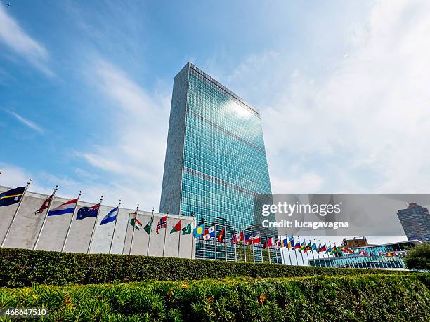 la sede central de las naciones unidas - edificio de las naciones unidas fotografías e imágenes de stock