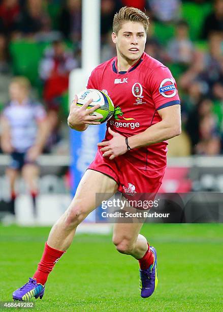 James OConnor of the Reds is tackled during the round eight Super Rugby match between the Rebels and the Reds at AAMI Park on April 3, 2015 in...