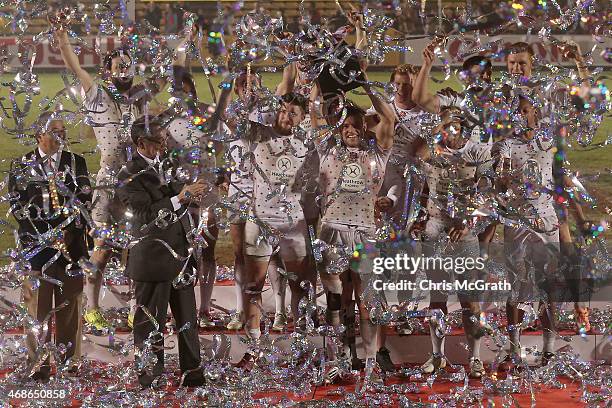 England players celebrate victory after defeating South Africa in the Cup Final on day two of the Tokyo Sevens Rugby 2015 at Chichibunomiya Rugby...