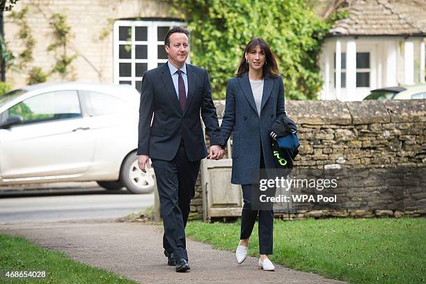 Prime Minister and leader of the Conservative Party, David Cameron and wife Samantha arrive to attend Easter Sunday service at St Nicholas church in...