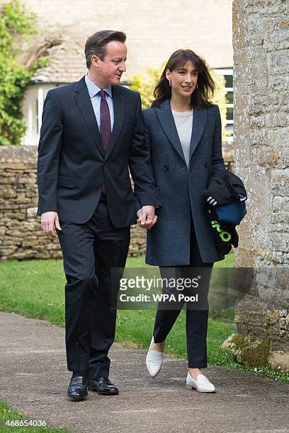Prime Minister and leader of the Conservative Party, David Cameron and wife Samantha arrive to attend Easter Sunday service at St Nicholas church in...