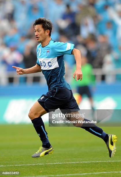 Kazuyoshi Miura of Yokohama FC celebrates scoring his team's first goal during the J.League second division match between Yokohama FC and Jubilo...