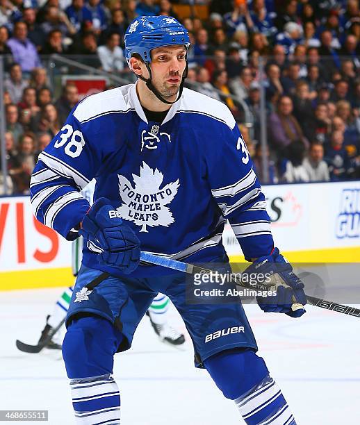 Frazer McLaren of the Toronto Maple Leafs skates up the ice during NHL action against the Vancouver Canucks at the Air Canada Centre February 8, 2014...