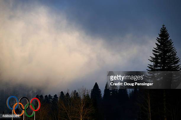 The Olympic rings are seen during the Sprint Free during day four of the Sochi 2014 Winter Olympics at Laura Cross-country Ski & Biathlon Center on...