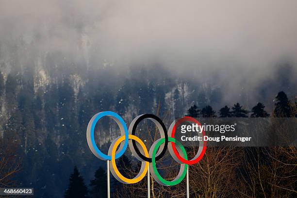 The Olympic rings are seen during the Sprint Free during day four of the Sochi 2014 Winter Olympics at Laura Cross-country Ski & Biathlon Center on...
