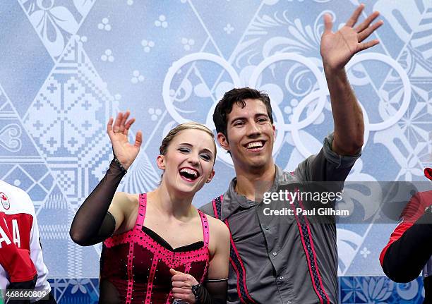 Paige Lawrence and Rudi Swiegers of Canada react after they compete during the Figure Skating Pairs Short Program on day four of the Sochi 2014...