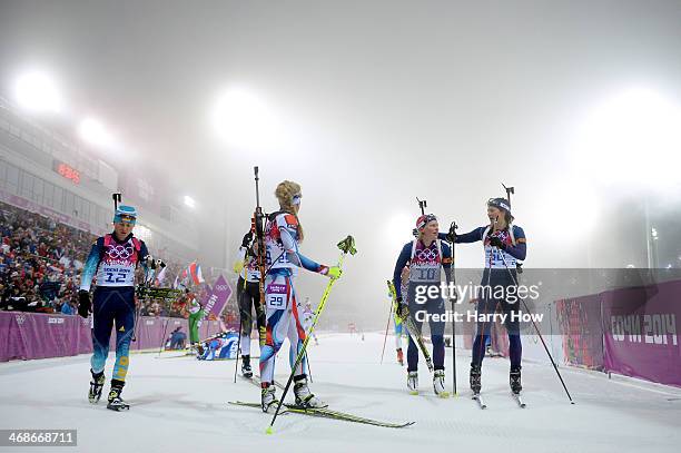 Valj Semerenko of Ukraine, Gabriela Soukalova of the Czech Republic, Tora Berger of Norway and Ann Kristin Aafedt Flatland of Norway finish the...