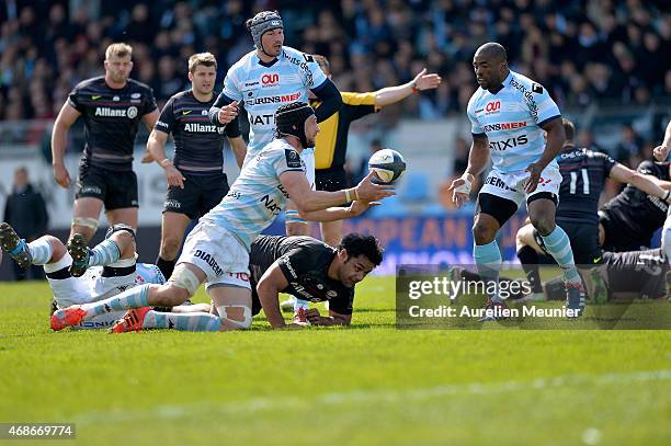 Luke Charteris of Racing Metro 92 passes the ball during the European Rugby Champions Cup quarter final match between Racing Metro 92 and Saracens at...