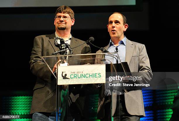 Tom Krazit of Gigaom and Keith Rabois of Khosla Ventures present the Best Technology Achievement award to Bitcoin at the 7th Annual Crunchies Awards...