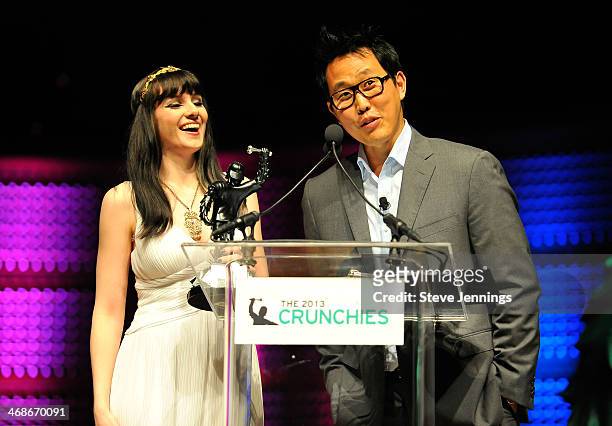 Jolie O'Dell of VentureBeat and David Lee of SV Angel present the Best New Startup of 2013 award at the 7th Annual Crunchies Awards at Davies...