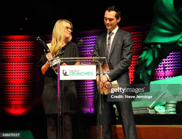 Katie Fehrenbacher of Gigaom and Nate Blecharczyk of Airbnb present the award for Biggest Social Impacy at the 7th Annual Crunchies Awards at Davies...