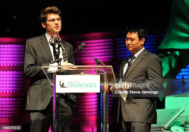Janko Roettgers of Gigaom and Andy Chang of UPS present the award for Best Hardware Startup at the 7th Annual Crunchies Awards at Davies Symphony...