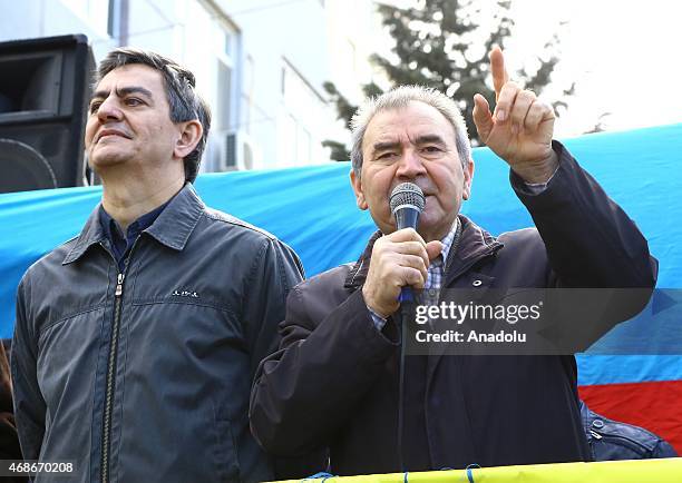 National Council Chairman Jamil Hasanli speaks next to Azerbaijan Popular Front Party leader Ali Karimli as a coalition named "National council"...