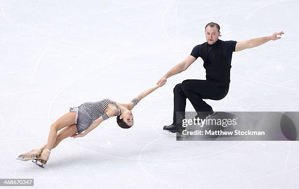 Vera Bazarova and Yuri Larionov of Russia compete during the Figure Skating Pairs Short Program on day four of the Sochi 2014 Winter Olympics at...