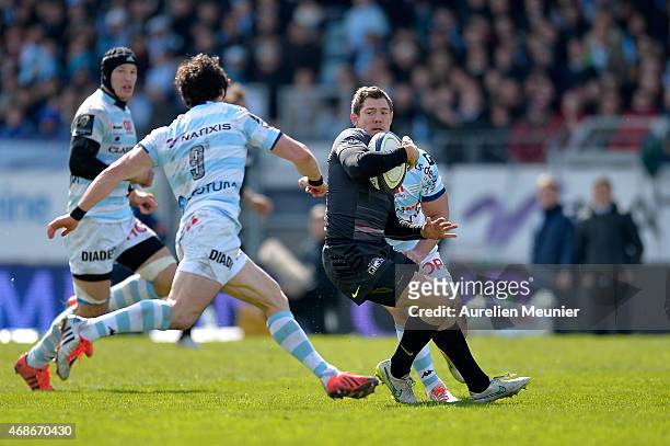 Alex Goode of Saracens breaks with ball during the European Rugby Champions Cup quarter final match between Racing Metro 92 and Saracens at Stade...