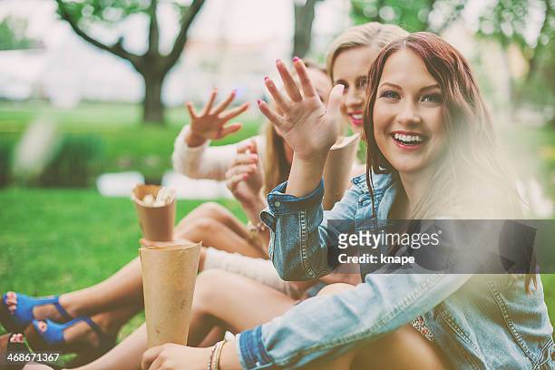 beautiful girls outdoors in a park - hangout festival day 3 stockfoto's en -beelden