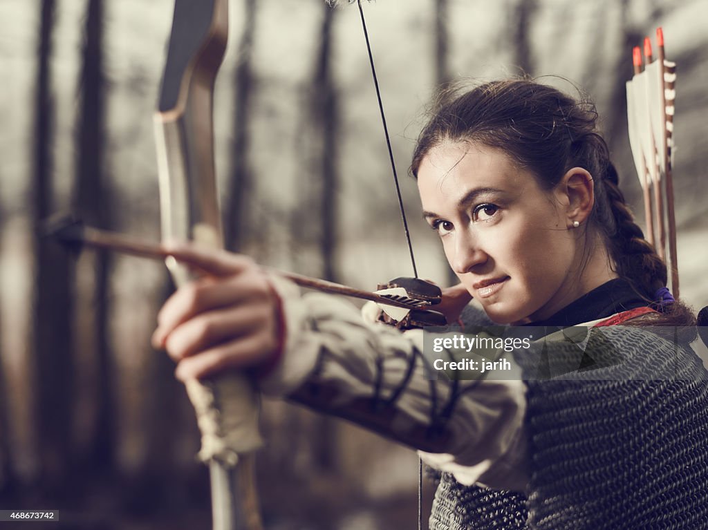 Medieval archery, woman shoot