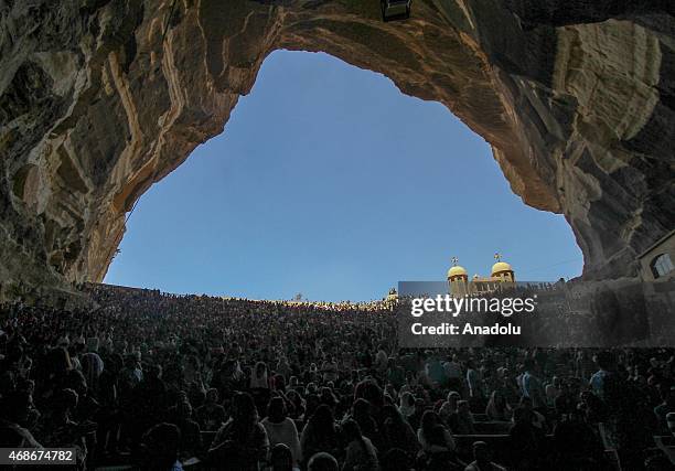 Orthodox Coptic Christians attend the Easter Mass at Simon Kheras Church in Mokattam southern of Cairo, Egypt on April 05, 2015.