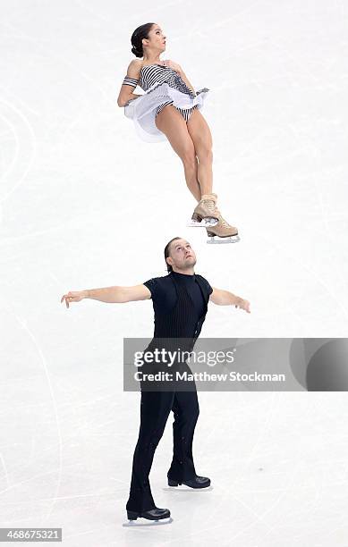 Vera Bazarova and Yuri Larionov of Russia compete during the Figure Skating Pairs Short Program on day four of the Sochi 2014 Winter Olympics at...