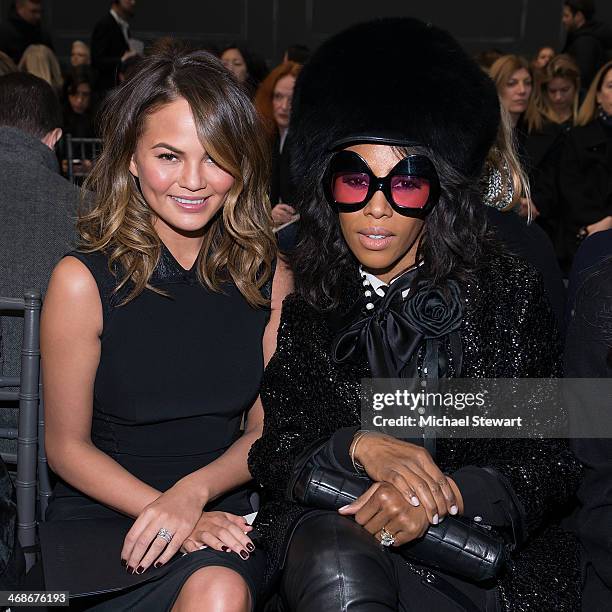 Model Chrissy Teigen and June Ambrose attend the Vera Wang Collection Show during Mercedes-Benz Fashion Week Fall 2014 at Dia Center on February 11,...