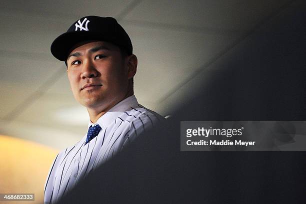 Masahiro Tanaka of the New York Yankees looks on during his introductory press conference at Yankee Stadium on February 11, 2014 in New York City.