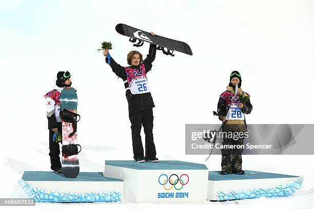 Silver medalist Ayumu Hirano of Japan, gold medalist Iouri Podladtchikov of Switzerland and bronze medalist Taku Hiraoka of Japan celebrate on the...