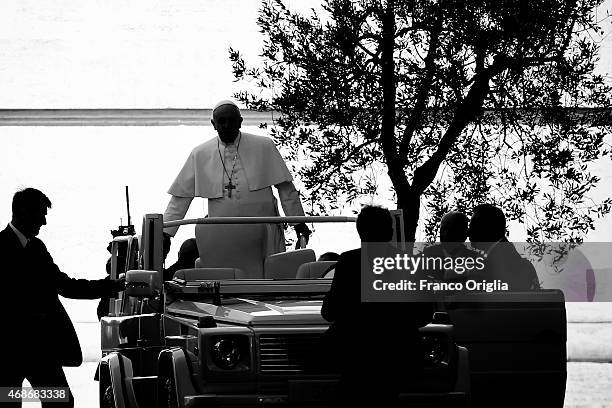 Pope Francis arrive on popemobile in St. Peter's square for his general audience on April 1, 2015 in Vatican City, Vatican.