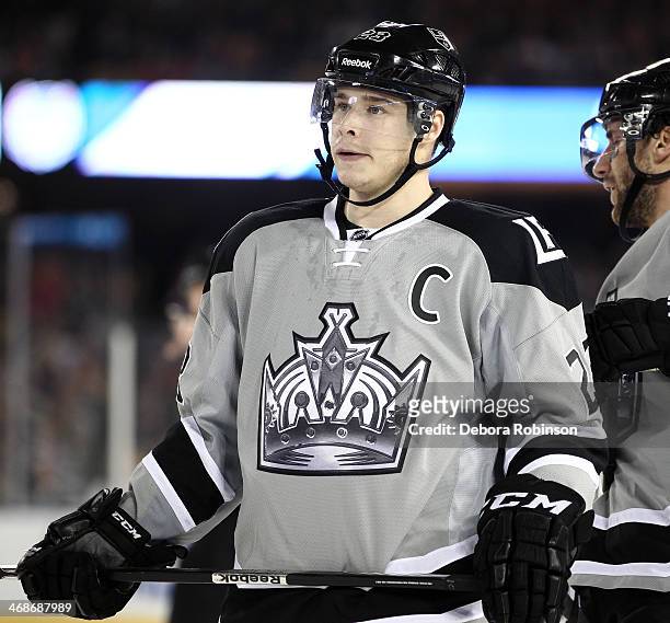 Dustin Brown of the Los Angeles Kings looks on against the Anaheim Ducks during the 2014 Coors Light NHL Stadium Series on January 25, 2014 at Dodger...