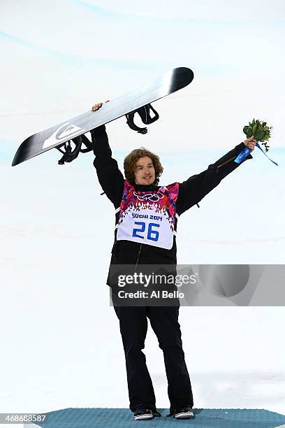 Gold medalist Iouri Podladtchikov of Switzerland celebrates on the podium during the flower ceremony for the Snowboard Men's Halfpipe Finals on day...
