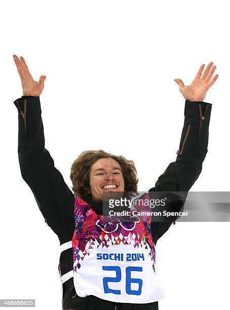 Gold medalist Iouri Podladtchikov of Switzerland celebrates on the podium during the flower ceremony for the Snowboard Men's Halfpipe Finals on day...