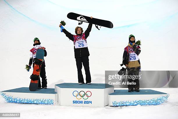 Silver medalist Ayumu Hirano of Japan, gold medalist Iouri Podladtchikov of Switzerland and bronze medalist Taku Hiraoka of Japan celebrate on the...