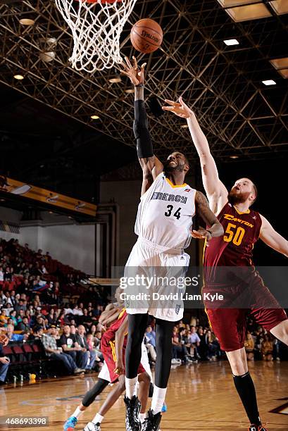 Willie Reed of the Iowa Energy shoots against Alex Kirk of the Canton Charge at the Canton Memorial Civic Center on April 3, 2015 in Canton, Ohio....