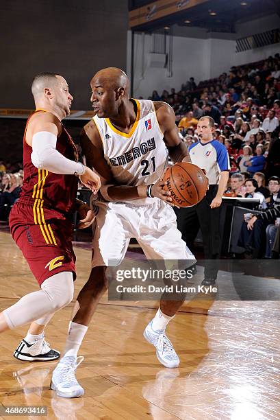 Damien Wilkins of the Iowa Energy drives to the basket against Antoine Agudio of the Canton Charge at the Canton Memorial Civic Center on April 3,...