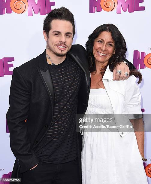 Casper Smart and mom Shawna Lopaz arrive at the Los Angeles premiere of 'HOME' at Regency Village Theatre on March 22, 2015 in Westwood, California.