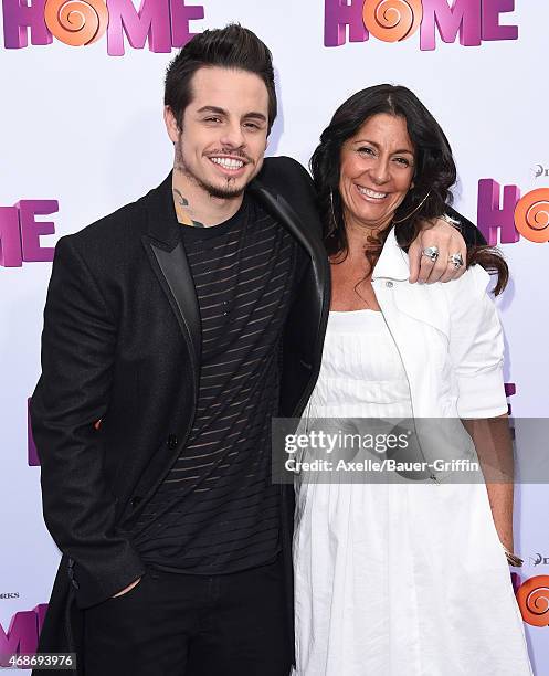 Casper Smart and mom Shawna Lopaz arrive at the Los Angeles premiere of 'HOME' at Regency Village Theatre on March 22, 2015 in Westwood, California.