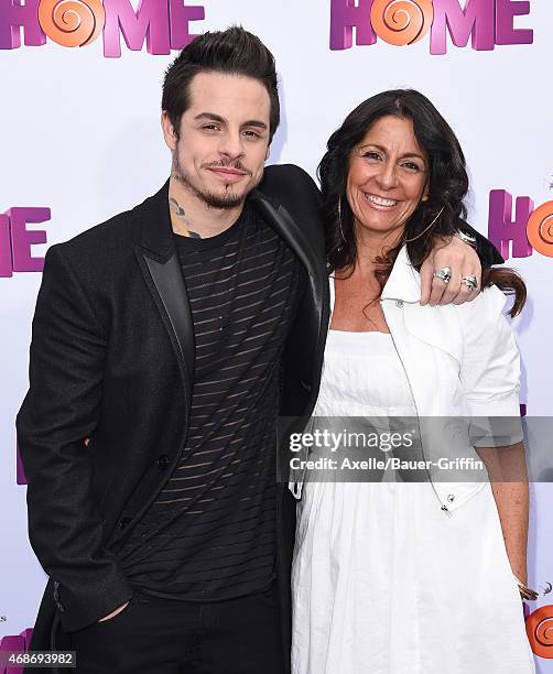 Casper Smart and mom Shawna Lopaz arrive at the Los Angeles premiere of 'HOME' at Regency Village Theatre on March 22, 2015 in Westwood, California.