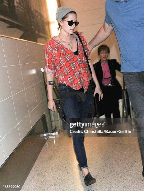 Kristen Stewart is seen at LAX on April 05, 2015 in Los Angeles, California.