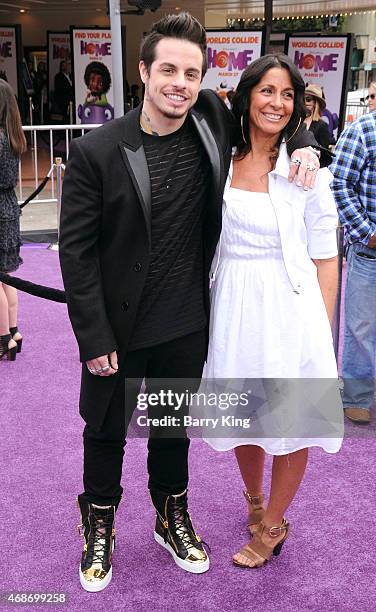 Dancer/choreographer Casper Smart and his mom Shawna Lopaz arrive at Twentieth Century Fox And Dreamworks Animation's 'Home' Premiere at Regency...